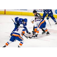 Syracuse Crunch forward Conor Geekie (top left) vs. the Bridgeport Islanders