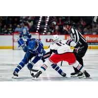 Syracuse Crunch forward Conor Geekie (left) faces off with the Hartford Wolf Pack