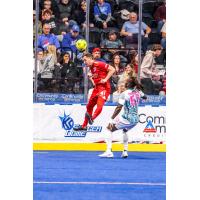St. Louis Ambush forward Axel Chakounte (right) vs. the Kansas City Comets