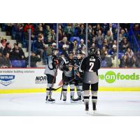 Vancouver Giants gather following a goal against the Kamloops Blazers