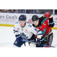 Kelowna Rockets right wing Carson Wetsch (right) vs. the Penticton Vees