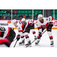 Belleville Senators centre Keean Washkurak (left) and defenceman Djibril Touré