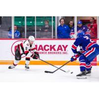 Belleville Senators centre Wyatt Bongiovanni (left) vs. the Rochester Americans