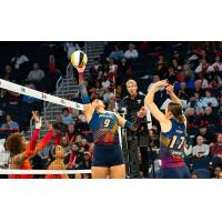 Grand Rapids Rise setter Saige Ka'aha'aina-Torres (left) and middle blocker Alyssa Jensen