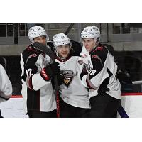 Vancouver Giants gather after a goal against the Wenatchee Wild