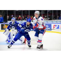 Syracuse Crunch defenseman Matteo Pietroniro (left) vs. the Rochester Americans