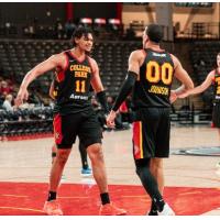 College Park Skyhawks forward Basheer Jihad (left) and guard Kobe Johnson